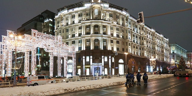 Artificial snow can be seen on Tverskaya Street in Moscow after it was placed over the weekend.