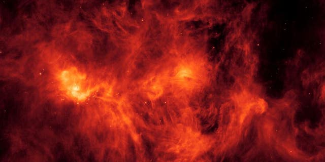 A collection of gas and dust over 500 light-years across, the Perseus Molecular Cloud hosts an abundance of young stars. (NASA/JPL-Caltech)