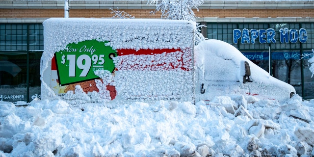 Nor'easter to bury Northeast in snow as deadly storm blamed for pileups, crashes snarl travel 6 A U-Haul truck sits snowed in by plows on First Street in downtown Duluth, Minn., on Sunday, Dec. 1, 2019.