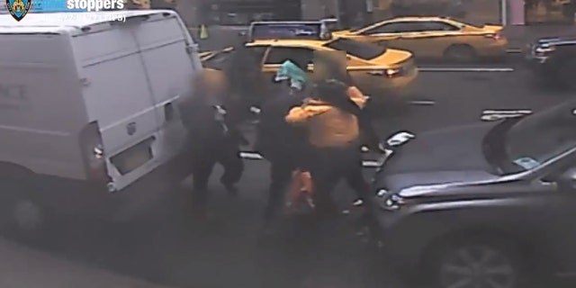 The brawl erupted outside the Barneys on Madison Ave on Nov. 18, according to the NYPD.