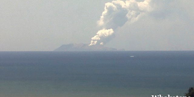 This image released by GNS Science, shows plumes of smoke from a volcanic eruption on White Island, seen from Whakatane, New Zealand Monday, Dec. 9, 2019.