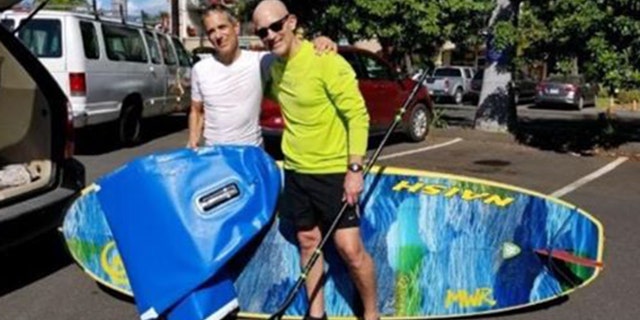 Fortunately, another paddler, identified as Al Gaston, was nearby and Oberto was able to get onto his board.