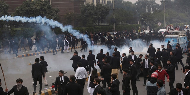 Police used tear gas shells to disperse angry lawyers during the scuffle.
