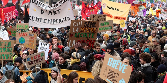 People fill the streets during a demonstration in Paris on Thursday.