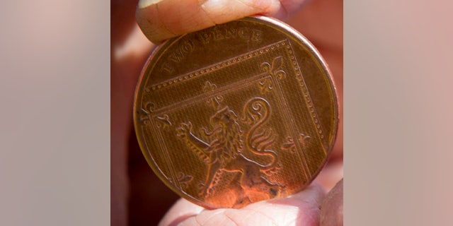 The coin that Isabelle choked on.