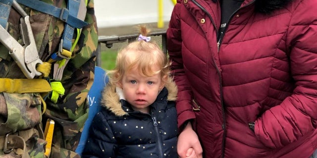 Isabelle was saved thanks to a construction worker who sprang into action when she was choking on a coin.