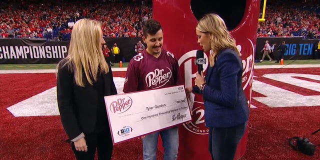 Tyler Gordon won the $100,000 scholarship from Dr. Pepper Saturday during the halftime of the Big Ten Championship.