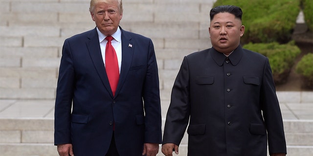 In this June 30 file photo, President Trump, left, meets with North Korean leader Kim Jong Un at the North Korean side of the border at the village of Panmunjom in Demilitarized Zone. (AP)
