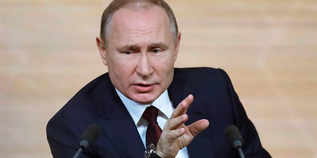 Russian President Vladimir Putin gestures during his annual news conference in Moscow, Russia, on Thursday. (AP)