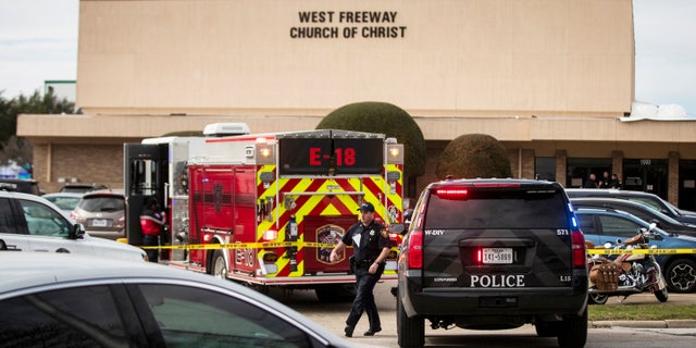 Police and fire departments surround the scene of a shooting at West Freeway Church of Christ in White Settlement, Texas, Sunday, Dec. 29, 2019.