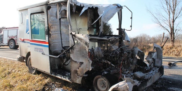 A U.S. Postal Service went up in flames Sunday in Kansas. A postal worker saved several packages slated for delivery.