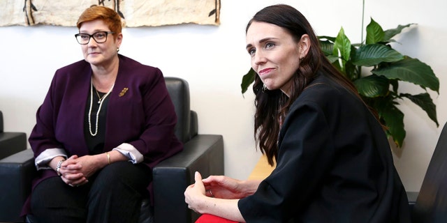 New Zealand Prime Minister Jacinda Ardern, right, sits with Australian Foreign Minister Marise Payne durng a meeting in Wellington on Dec 16, 2019.