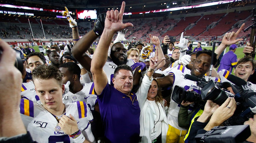 LSU's Edwards-Helaire still mending, a no-show for media day