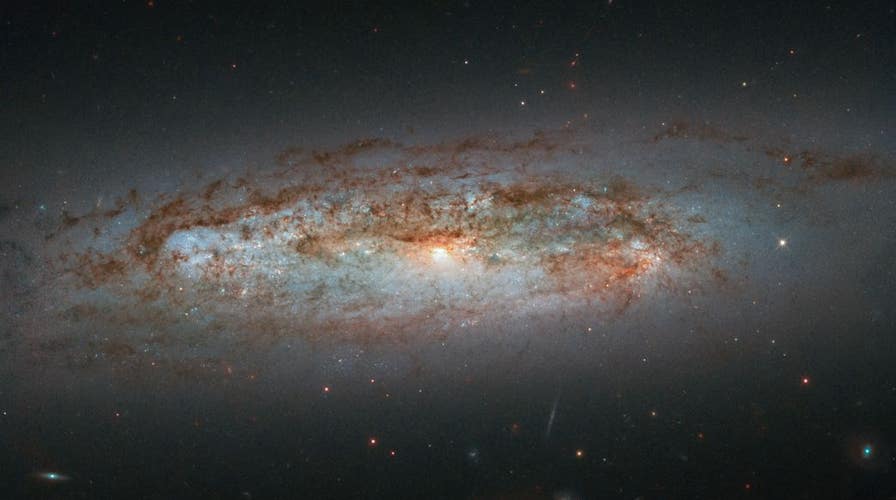 NASA's Hubble captures dazzling distant galaxy | Fox News NASA's Hubble captures dazzling distant galaxy | Fox News