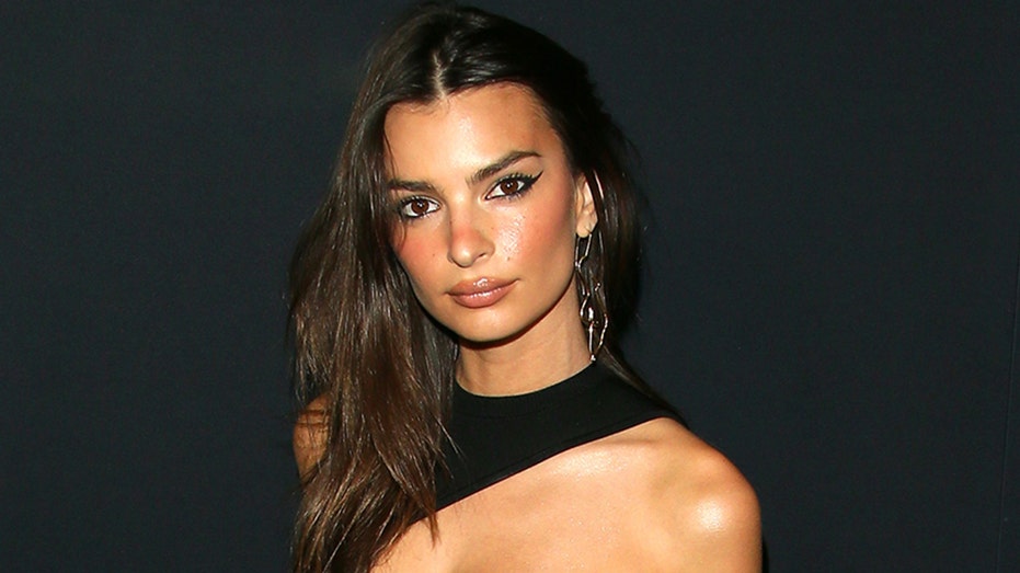 See Emily Ratajkowski Pose in a Fiery High-Cut Thong Bikini