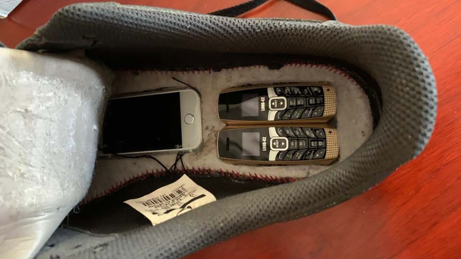 Tiny phones hidden in Nike sneakers 