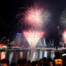 Brisbane, Australia: Crowds watch a fireworks display during New Year's Eve celebrations. 