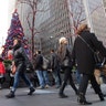 People walk past FOX Square on Sixth Avenue in New York City.