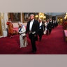 Queen Elizabeth II and President Donald Trump arrive through the East Gallery for a State Banquet at Buckingham Palace in London, June 3, 2019.