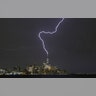Lightning strikes One World Trade Center during a thunderstorm in New York City, July 17, 2019.