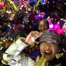 Beijing, China: People celebrate the arrival of the year 2020 at a New Year's Eve countdown near the 2022 Bejing Winter Olympic headquarters. (AP Photo/Ng Han Guan)