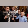 Bremen, Germany: Rabbi Natanel Teitelbaum, left, lights a Hanukkah candle together with Holocaust survivor Grigori Skoblov (90) at the Hanukkah celebration in the Jewish Community Center in Bremen on the occasion of the "International Survivors' Night" of the Jewish Claims Conference.?