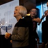 New York, United States: As a menorah is lighted, symbolizing the first day of Hanukkah, survivors of the Holocaust and other participants gather at the Museum of Jewish Heritage, to recognize International Holocaust Survivors Night. 