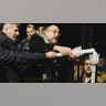 Warsaw, Poland: Poland's chief rabbi Michael Schudrich, right, lights a Hanukkah candle. Poland was home to the largest Jewish community in World War II before the Holocaust. Today the Jewish community is very small.