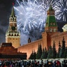 Moscow, Russia: Fireworks explode over the Kremlin during New Year's celebrations in Red Square with the Spasskaya Tower, left, in the background. Russians began the world's longest continuous New Year's Eve with fireworks and a message from President Vladimir Putin urging them to work together in the coming year. (AP Photo/Denis Tyrin)