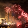 Bangkok, Thailand:  Fireworks explode over the Chao Phraya River during New Year celebrations. (AP Photo/Sakchai Lalit)