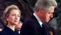 FILE - In this Dec. 19, 1998 file photo, first lady Hillary Rodham Clinton watches President Clinton pause as he thanks those Democratic members of the House of Representatives who voted against impeachment at the White House in Washington. (AP Photo/Susan Walsh, File)