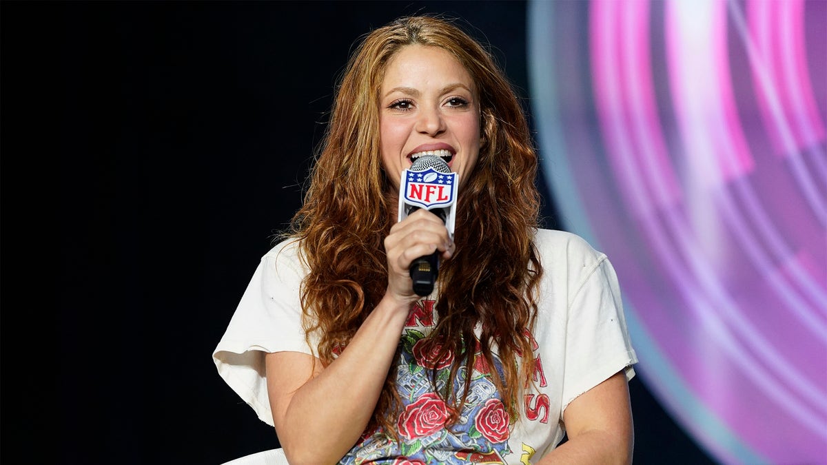 Shakira answers questions at a Super Bowl 54 press conference on Thursday.