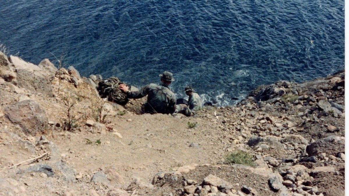 Hannel ascending a cliff during a military exercise in late 1987. (Eric Hannel)
