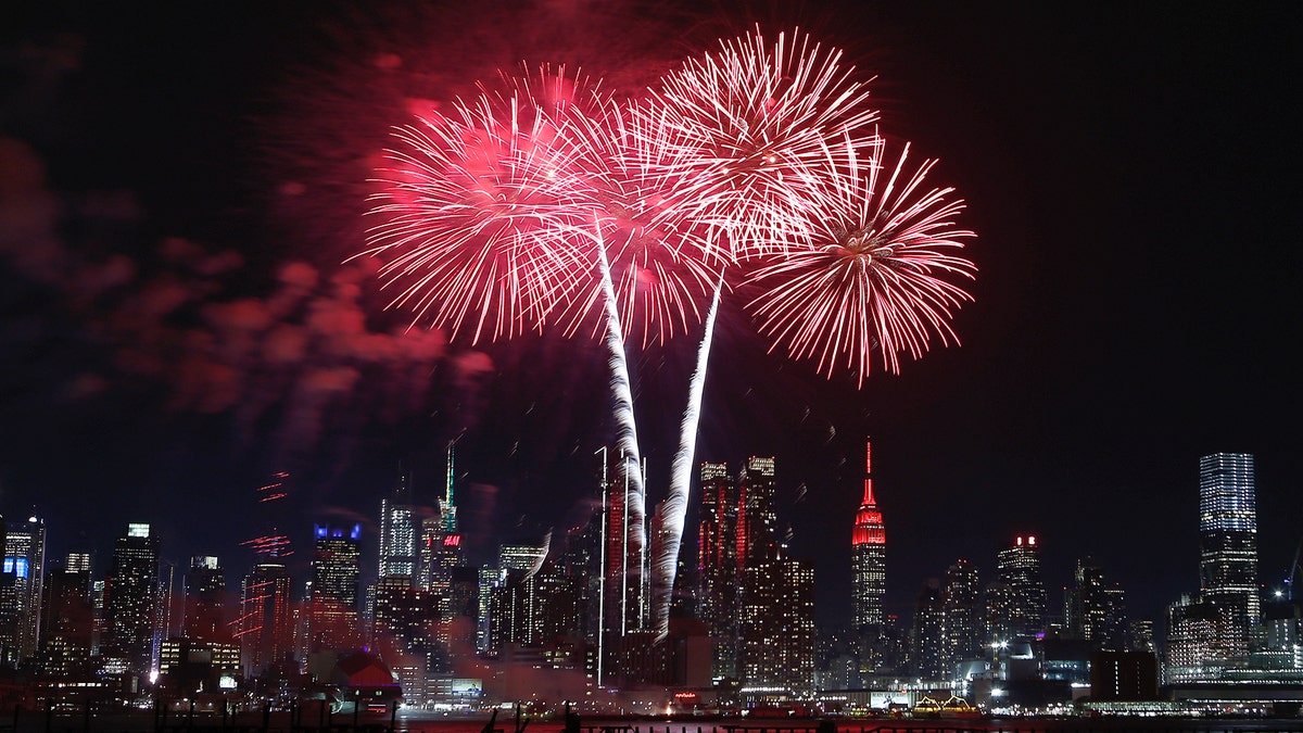 WEEHAWKEN, NJ - JANUARY 23: Fireworks light up the sky over the skyline of midtown Manhattan and the Empire State Building in New York City celebrating the upcoming Chinese New Year on January 23, 2020 as seen from Weehawken, New Jersey. (Photo by Gary Hershorn/Getty Images)