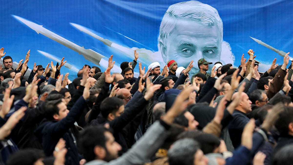 Protesters demonstrate over the U.S. airstrike in Iraq that killed Iranian Revolutionary Guard Gen. Qassem Soleimani in Tehran, Iran, Saturday Jan. 4, 2020. (Associated Press)