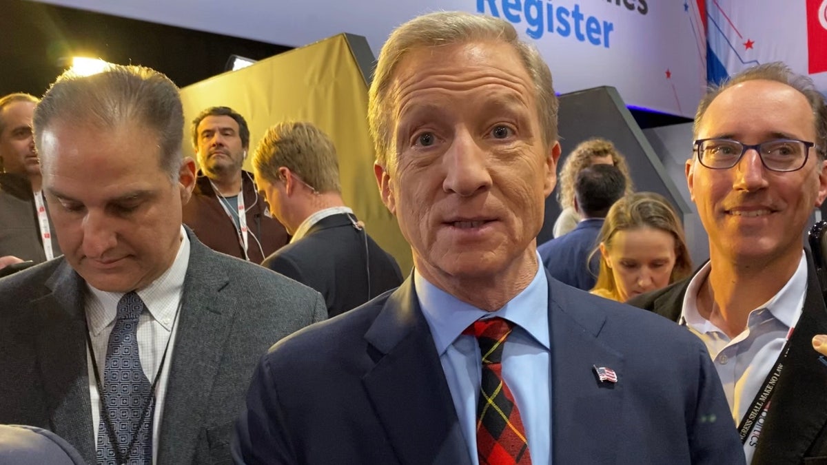 Democratic presidential candidate Tom Steyer makes his way through the spin room at the Democratic presidential debate in Iowa, in Des Moines, Iowa on Jan. 14, 2020
