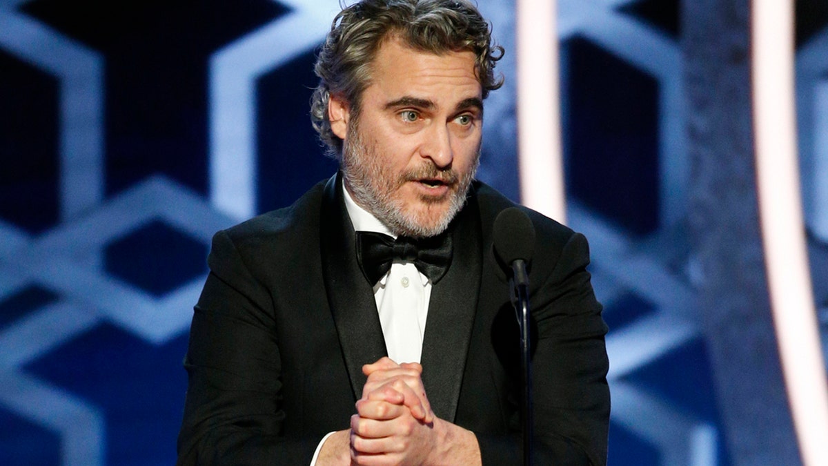 This image released by NBC shows Joaquin Phoenix accepting the award for best actor in a motion picture drama for his role in "Joker" at the 77th Annual Golden Globe Awards at the Beverly Hilton Hotel in Beverly Hills, Calif., on Sunday, Jan. 5, 2020.