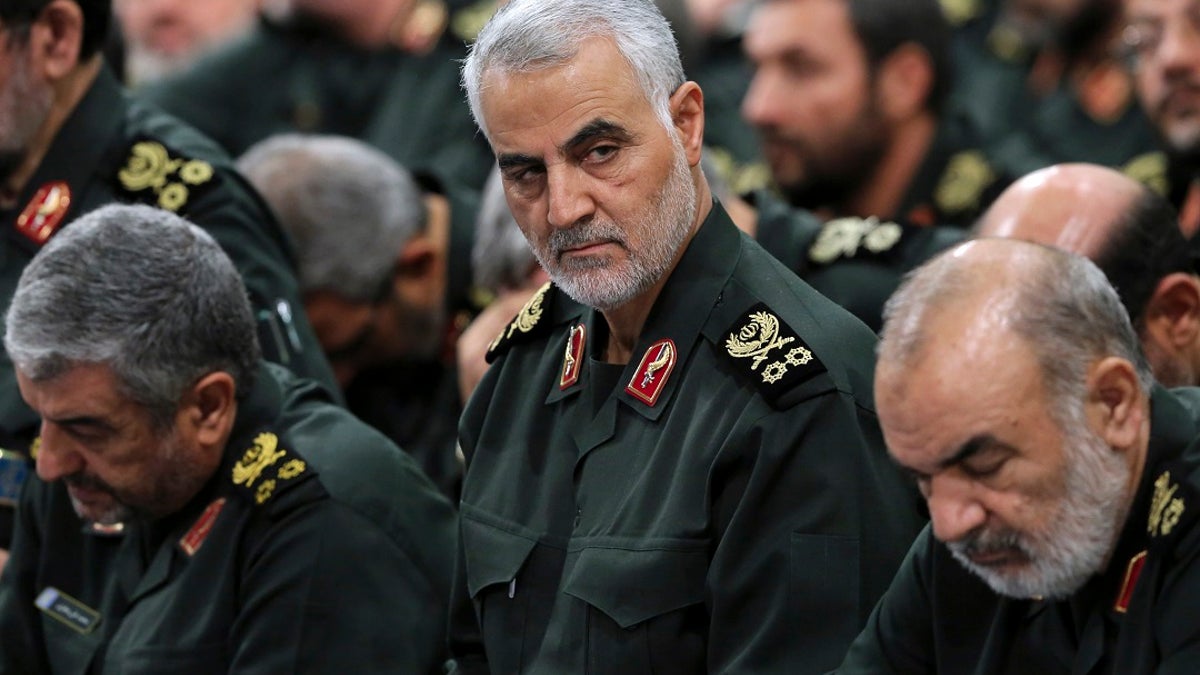 Deceased Iranian Revolutionary Guard Gen. Qassem Soleimani, center, attends a meeting in Tehran in 2016. A woman in Kosovo was arrested Tuesday over social media post criticizing the United States for killing the Iranian military commander in a drone strike last week. (via AP, File)