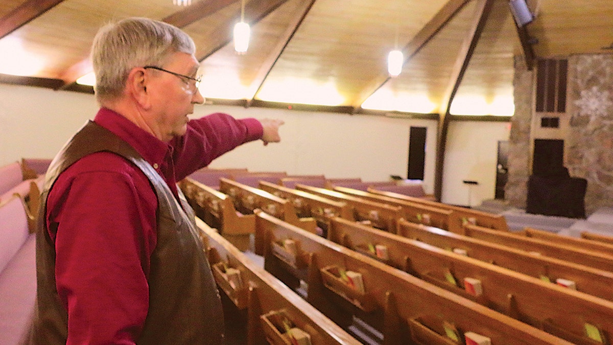In this Dec. 27, 2019, photo, Bart Bartels, who leads the security team at Northfield Church in Gering, Neb., talks about how members of the church's security team. (Maunette Loeks/The Star-Herald via AP)