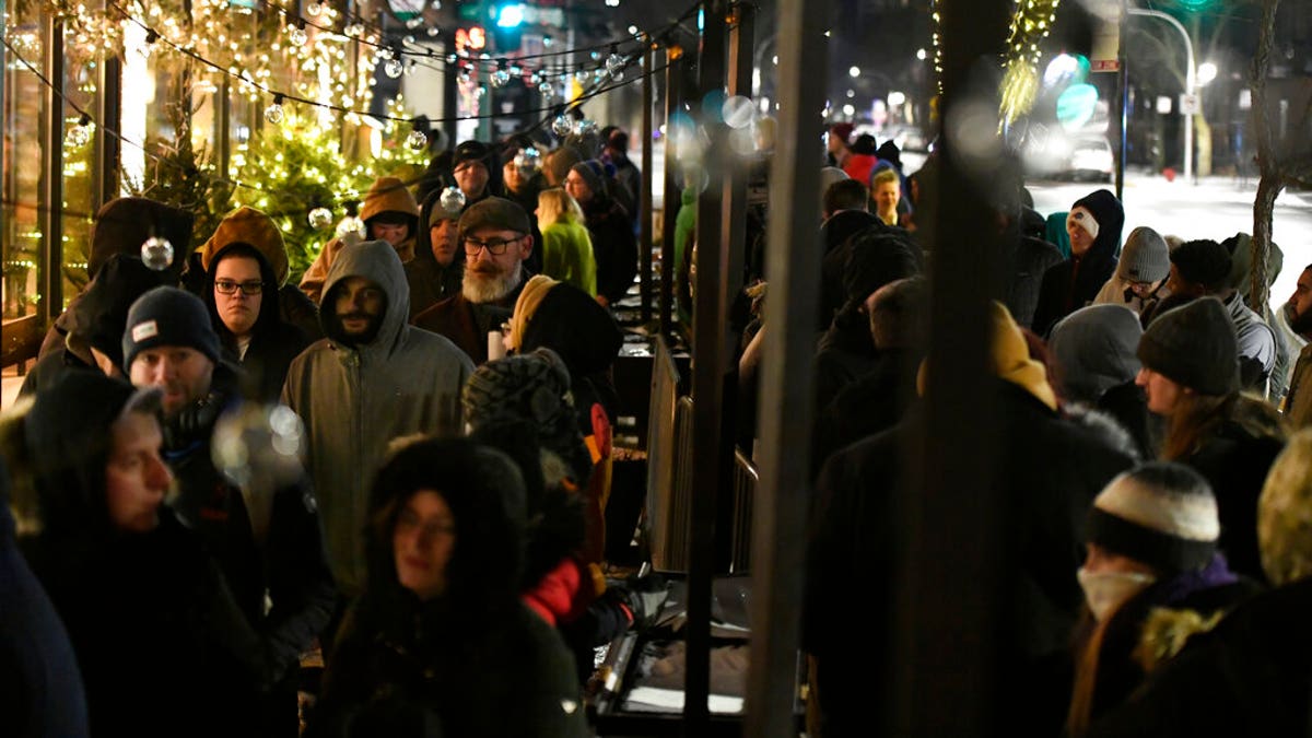 People began lining up on Wednesday at 6 a.m., the earliest that Illinois' new law allowed such sales. (AP Photo/Paul Beaty)