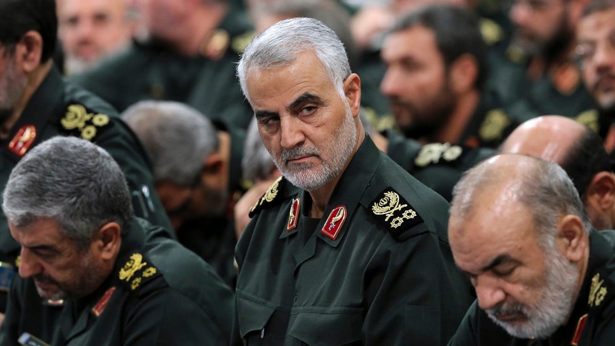 Revolutionary Guard Gen. Qassem Soleimani, center, attends a meeting in Tehran, Iran. Iraqi TV and three Iraqi officials said Friday that Soleimani, the head of Iran’s elite Quds Force, has been killed in an airstrike at Baghdad’s international airport.