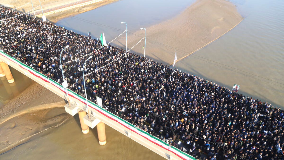 Mourners at a funeral ceremony for Gen. Qassem Soleimani in the southwestern city of Ahvaz, Iran, on Sunday. (Morteza Jaberian/Mehr News Agency via AP)