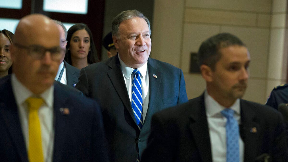 Secretary of State Mike Pompeo arrives to conduct a briefing on last week's targeted killing of Iran's senior military commander Gen. Qassem Soleimani on Capitol Hill, in Washington, Wednesday, Jan. 8, 2020. (AP Photo/Jose Luis Magana)