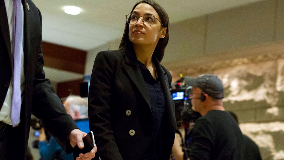 Rep. Alexandria Ocasio-Cortez, D-N.Y., arrives for a briefing on last week's targeted killing of Iran's senior military commander Gen. Qassem Soleimani on Capitol Hill, in Washington, Wednesday, Jan. 8, 2020. (AP Photo/Jose Luis Magana)