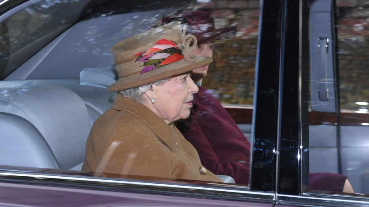 Britain's Queen Elizabeth II arrives to attend a morning church service at St Mary Magdalene Church in Sandringham, England, Sunday Jan. 12, 2020. Prince Harry and his wife Meghan have declared they will “work to become financially independent” as part of a surprise announcement saying they wish "to step back" as senior members of the royal family. (Joe Giddens/PA via AP)