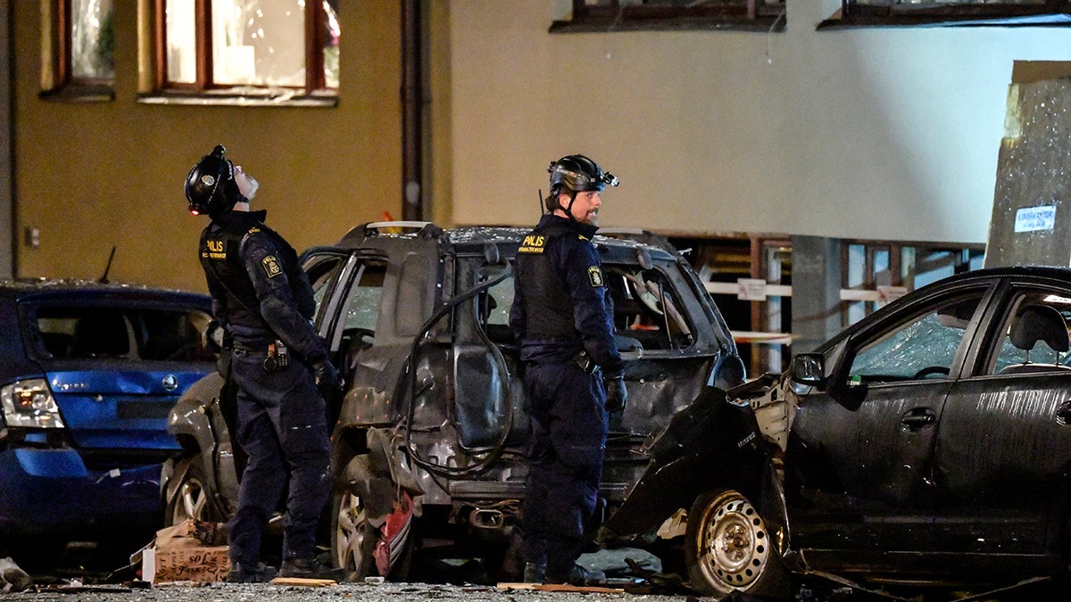 Police work at the scene of an explosion that caused damage to a residential building in central Stockholm, early Monday, Jan. 13, 2020. There were no reported injuries. (Anders Wiklund/TT News Agency via AP)