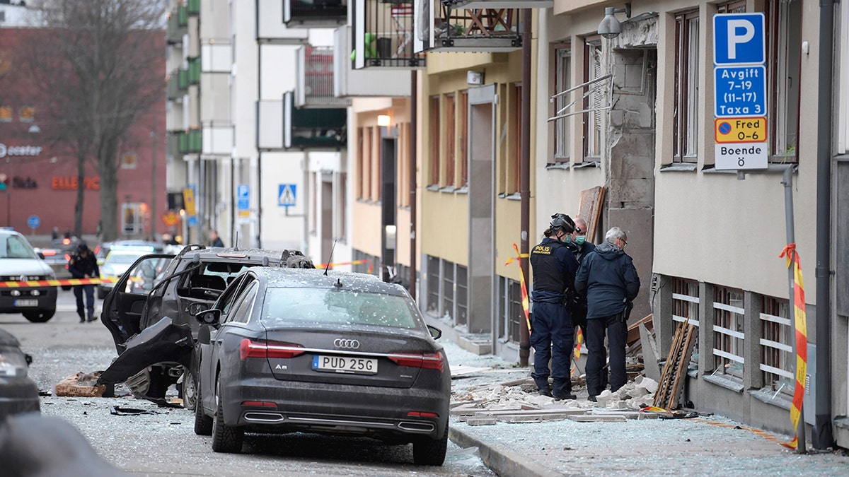 Police work at the scene of an explosion which caused damage to a residential building in central Stockholm, Monday, Jan. 13, 2020. There were no reported injuries. (Janerik Henriksson /TT News Agency via AP)