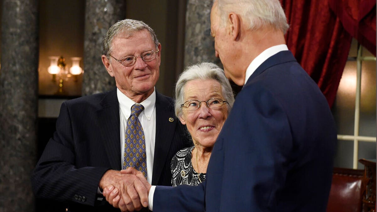 Vice President Joe Biden greets Sen. James Inhofe and his wife Kay Inhofe after a Senate re-enactment swearing-in ceremony in Washington, Jan. 6, 2015. (Associated Press)