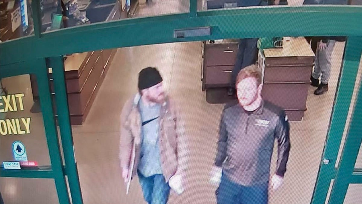 This image from a Jan. 1, 2020 surveillance video and released in a U.S. Attorney detention memorandum, shows Brian Mark Lemley Jr, right, and Patrik Mathews leaving a store in Delaware where they purchased ammunition and paper shooting targets. The pair, along with William Garfield Bilbrough IV, plotted to carry out "essentially a paramilitary strike" at a Virginia gun rights rally, a federal prosecutor said. (U.S. Attorney via AP)