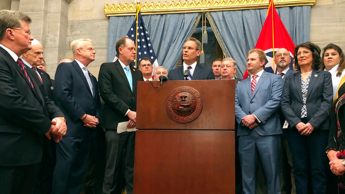 Tennessee Gov. Bill Lee, center, and fellow Republicans in the state General Assembly hold a news conference at the Tennessee Capitol on Thursday, Jan. 23, 2020, in Nashville,Tenn., to discuss a new anti-abortion proposal. (AP Photo/Jonathan Mattise)